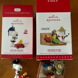 Snoopy Keepsake Ornaments.  Officer Snoopy and Race is on.